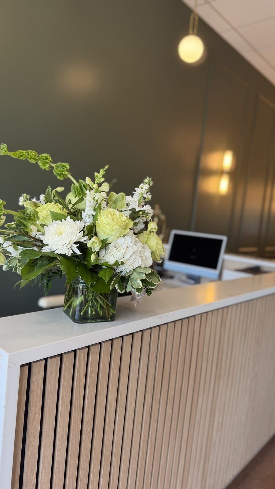 Fresh flowers at our front desk